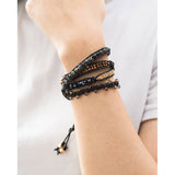 PULSERA NEGRA CARBON CON DORADO