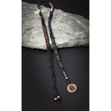PULSERA NEGRA CARBON CON DORADO
