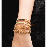 PULSERA OCRE DORADA